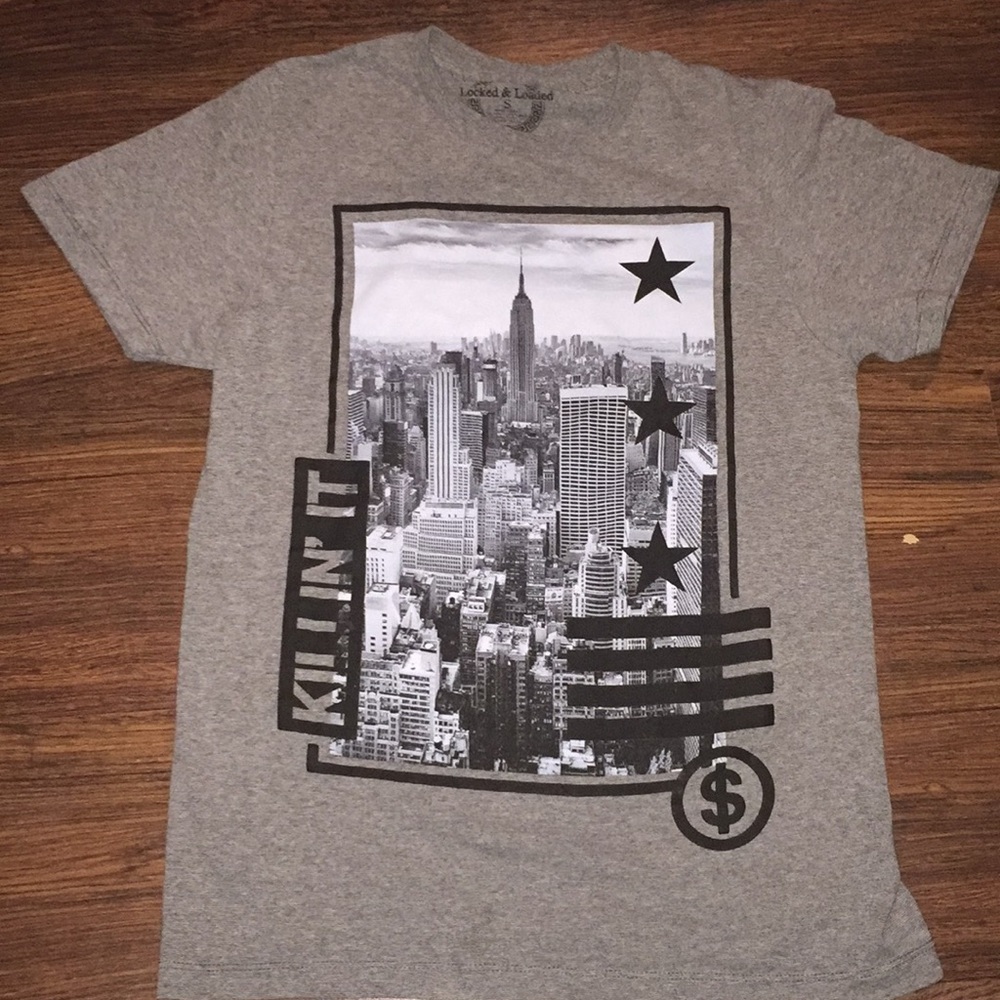 A grey locked and loaded t shirt
